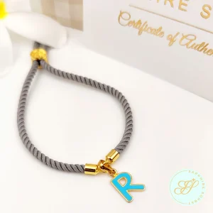 Monogram R Gold Rakhi