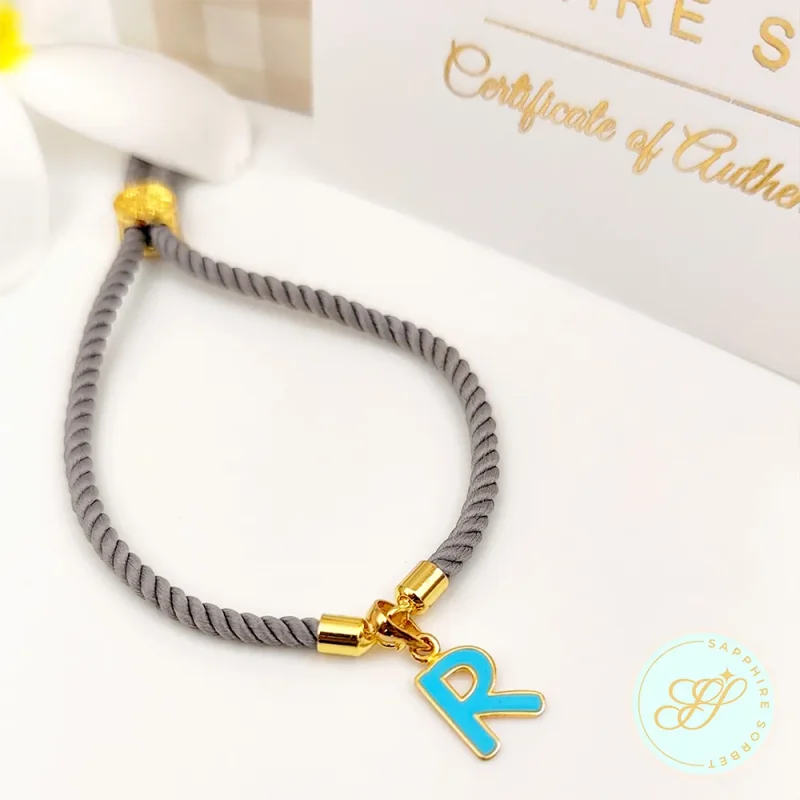 Monogram R Gold Rakhi